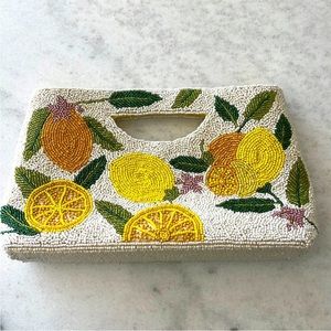America and Beyond Lemon beaded handbag comes with chain